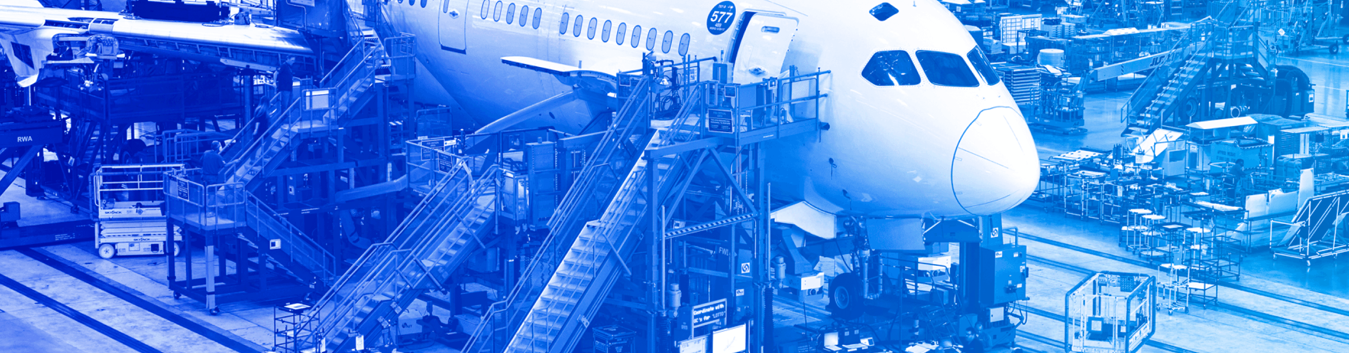 Airliner parked in a maintenance hangar