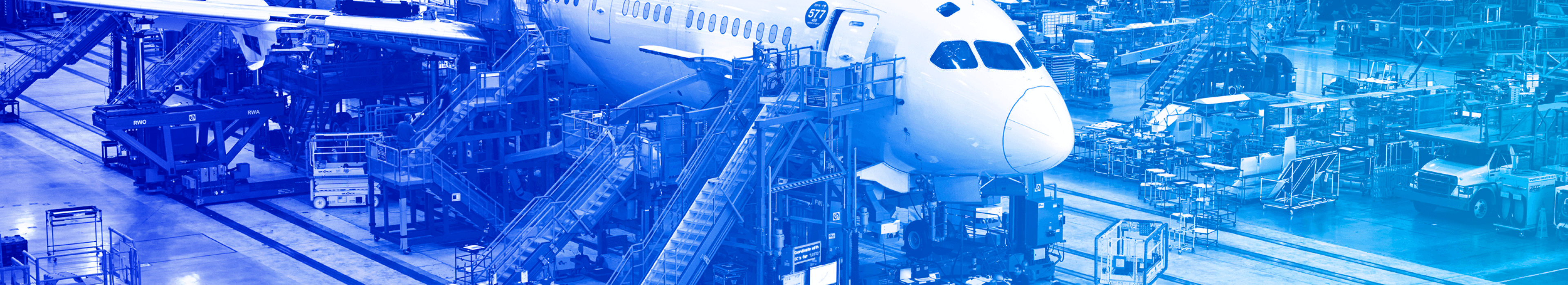 Airliner parked in a maintenance hangar