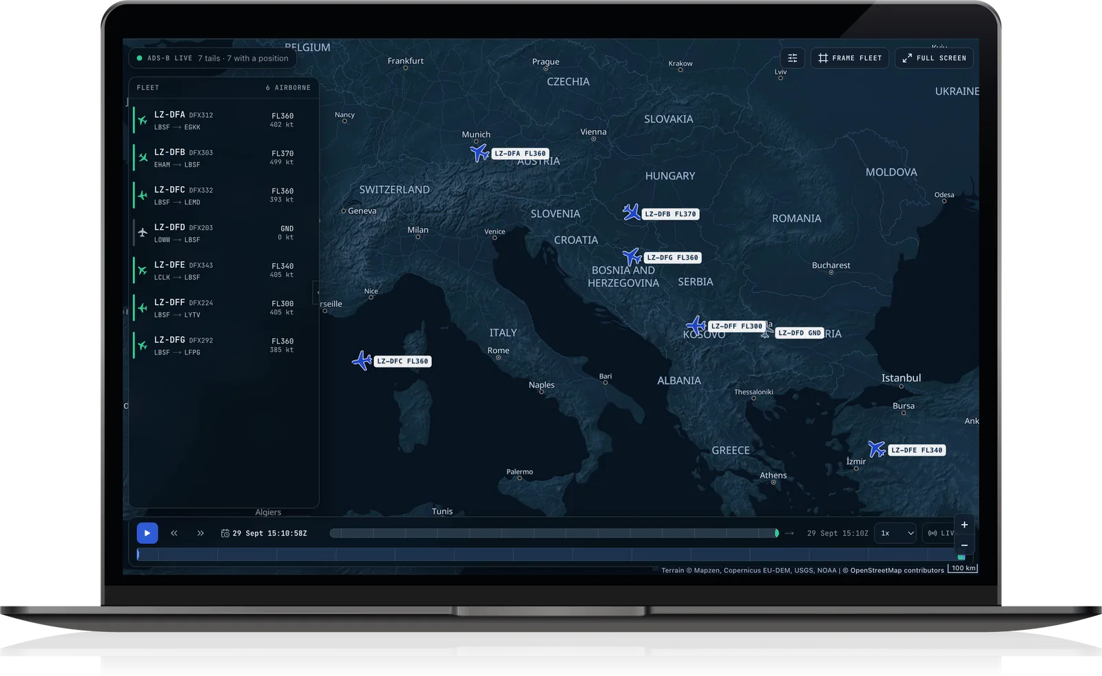 Live Fleet Monitoring in AeroSight FDM v2 on a laptop: the fleet on a near-live map, each aircraft in flight or on the ground